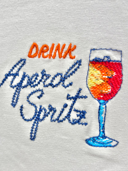 Damen T-Shirt „Drink Aperol Spritz“ – Weiß mit Stickerei